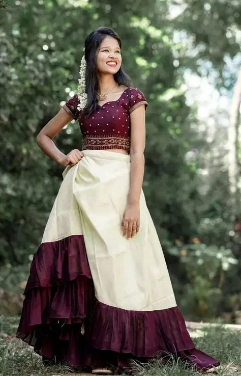 പട്ടുപാവാടയിൽ നിന്ന് പ്രചോദനം ഉൾക്കൊണ്ട് പലതരത്തിലുള്ള മോഡലുകളാണ് ഇപ്പോൾ ഇറങ്ങുന്നത് - ഫോട്ടോ NEWS9