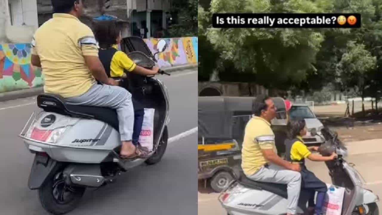 Viral Video: കുട്ടിക്കളി കുറച്ചുകൂടി പോയി; അച്ഛനെ പിടിച്ച് അകത്തിടണം; പ്രായപൂര്ത്തിയാകാത്ത പെണ്കുട്ടി സ്കൂട്ടര് ഓടിക്കുന്നു; അലക്ഷ്യമായി പിന്നിലിരുന്നു അച്ഛൻ Viral Video: കുട്ടിക്കളി കുറച്ചുകൂടി പോയി; അച്ഛനെ പിടിച്ച് അകത്തിടണം; പ്രായപൂര്ത്തിയാകാത്ത പെണ്കുട്ടി സ്കൂട്ടര് ഓടിക്കുന്നു; അലക്ഷ്യമായി പിന്നിലിരുന്നു അച്ഛൻ