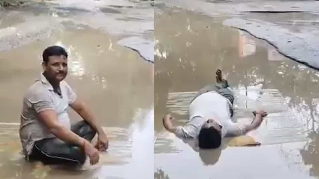 Viral Video: മകൾ റോഡിലെ കുഴിയിൽ വീണു; വെള്ളക്കെട്ടിൽ കിടന്ന് പിതാവ്