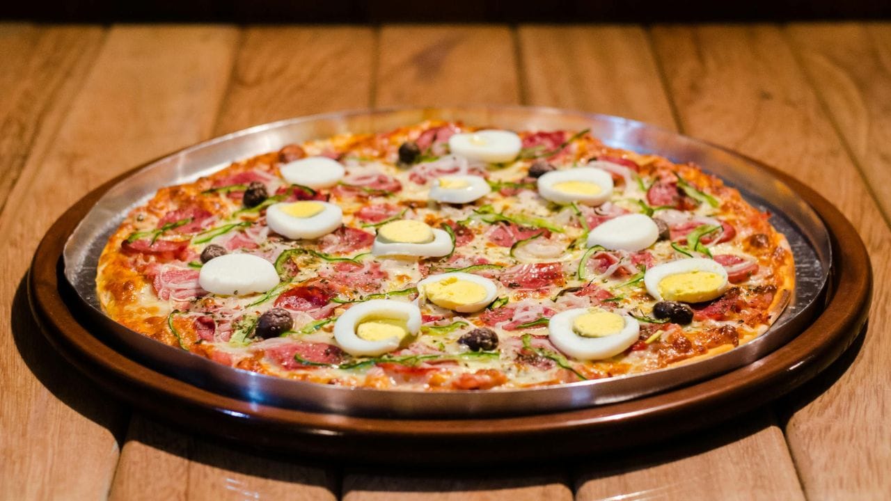 വൈകിട്ട് ഓർഡർ ചെയ്ത പൈസ ബാക്കി വന്നാൽ പിറ്റേ ദിവസം കഴിക്കാറുണ്ടോ? ഇത്തരത്തിൽ ബാക്കി വന്ന പിസ കഴിക്കുന്നത് ആരോഗ്യത്തെ ബാധിക്കുമോയെന്ന് നോക്കാം. (Image Credits: Pexels)