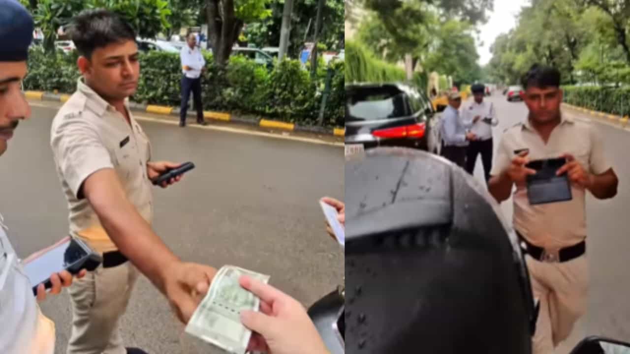 Viral Video: കൈക്കൂലി, രസീതിൽ കുടുങ്ങി പോലീസുകാരൻ, അവസ്ഥ പറഞ്ഞ് വിനോദ സഞ്ചാരി Viral Video: കൈക്കൂലി, രസീതിൽ കുടുങ്ങി പോലീസുകാരൻ, അവസ്ഥ പറഞ്ഞ് വിനോദ സഞ്ചാരി