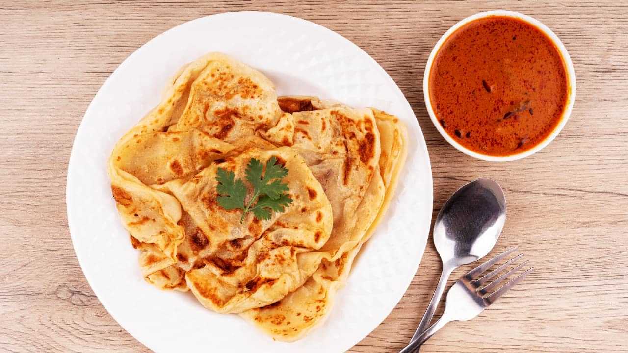 പോറോട്ട എത്തിയത് എവിടെ നിന്ന്? കേരളത്തിൽ നിന്നോ തമിഴ്നാട്ടിൽ നിന്നോ! തർക്കം മുറുകുന്നു...; പിന്നിലെ കഥ അറിയാം