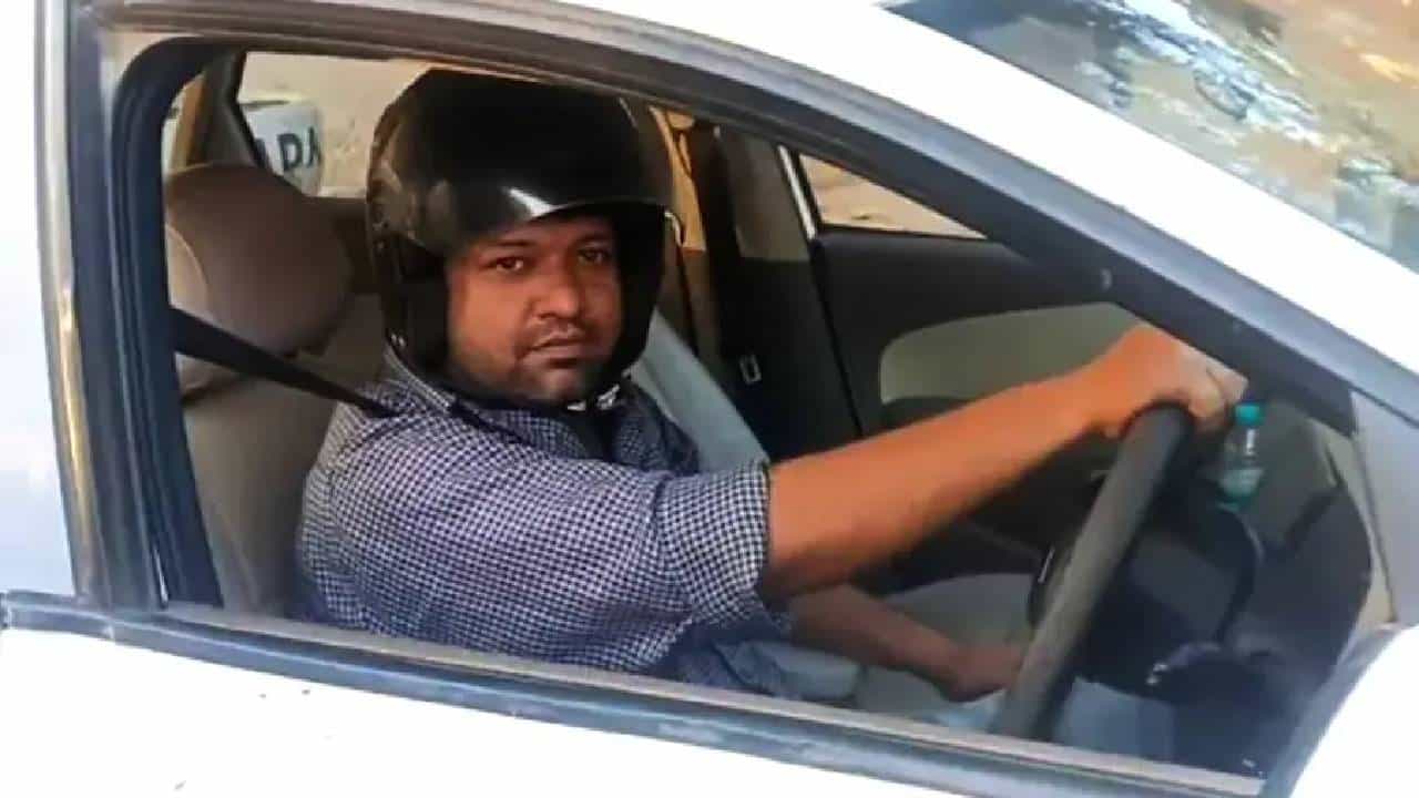 Viral Video: ഇനി കാറിലും ഹെല്‍മറ്റ്; പ്രതിജ്ഞയെടുത്ത് അധ്യാപകൻ; പിഴ ചുമത്തിയതിനെതിരെ പ്രതിഷേധം