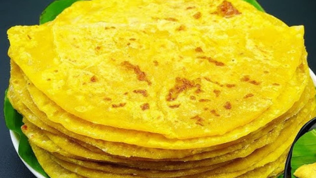 കുക്കറിലെ വെള്ളം മുഴുവനായി ഊറ്റിക്കളഞ്ഞ ശേഷം പരിപ്പ്, ശർക്കര/പഞ്ചസാര, വേവിച്ച ചോറ്, ഏലയ്ക്കാപ്പൊടി എന്നിവ ചേർത്ത് മിക്സിയുടെ ചെറിയ ജാറിലിട്ട് വെള്ളം ചേർക്കാതെ വെണ്ണ പോലെ അരച്ചെടുക്കുക. അരച്ചുവെച്ച ഈ കൂട്ട് ഒരു പാനിലിട്ട് ചെറുതീയിൽ 3-4 മിനിറ്റ് ഇളക്കുക. ഈർപ്പം വറ്റി പാത്രത്തിൽ നിന്ന് വിട്ടു വരുമ്പോൾ തീ അണച്ച് തണുക്കാൻ വെക്കുക. തണുത്ത ശേഷം ചെറിയ ഉരുളകളാക്കി മാറ്റി വെക്കുക. കുതിർത്തുവെച്ച മൈദമാവിൽ നിന്ന് ചെറിയ ഭാഗമെടുത്ത് കയ്യിൽ വെച്ച് പരത്തി, ഉള്ളിൽ കടലപ്പരിപ്പ് ഉരുള വെച്ച് നന്നായി പൊതിയുക.